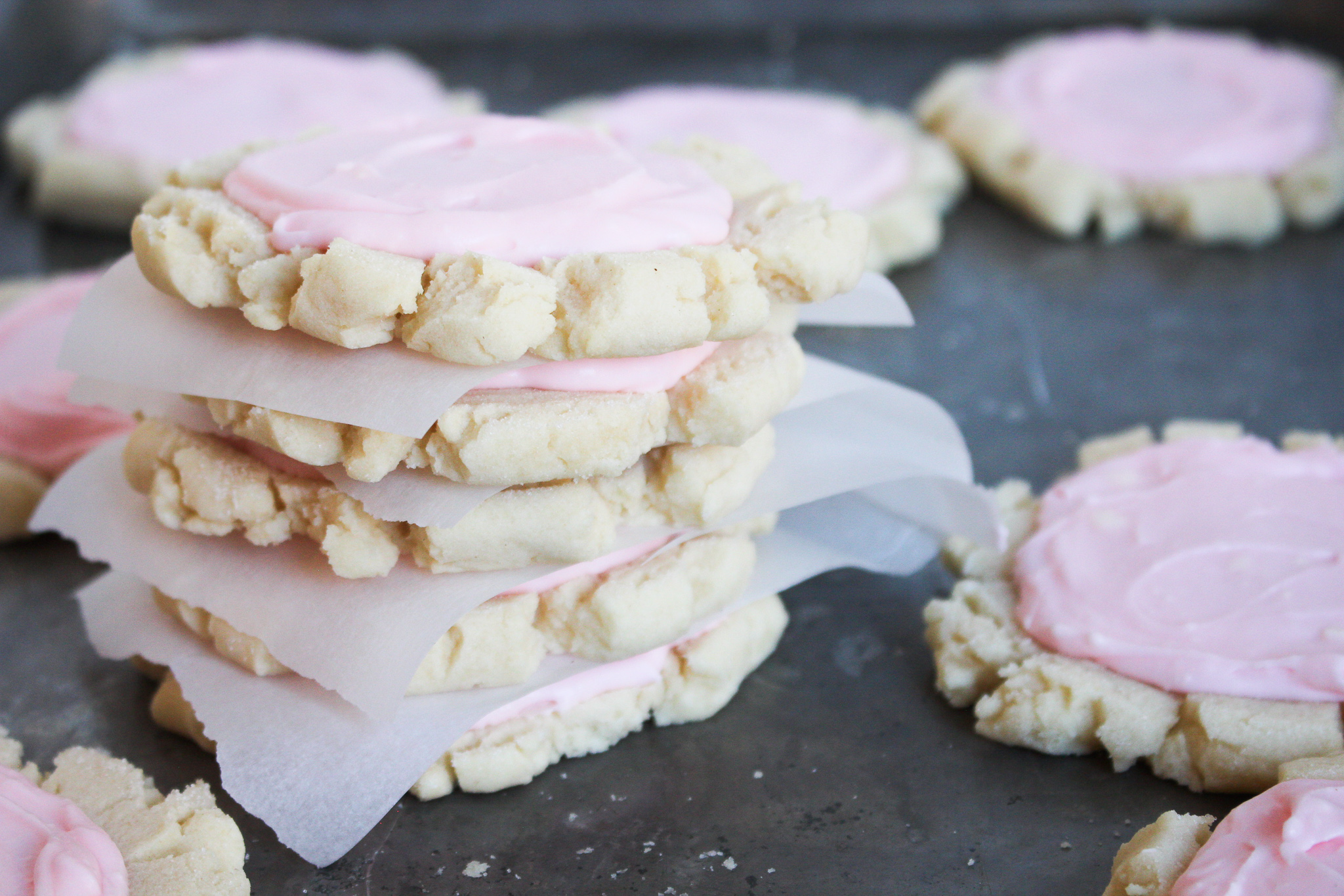 The best sugar cookies out there. These freeze so good too! #stayfitmom #sugarcookierecipe #sugarcookie #pinksugar #recipe #bake