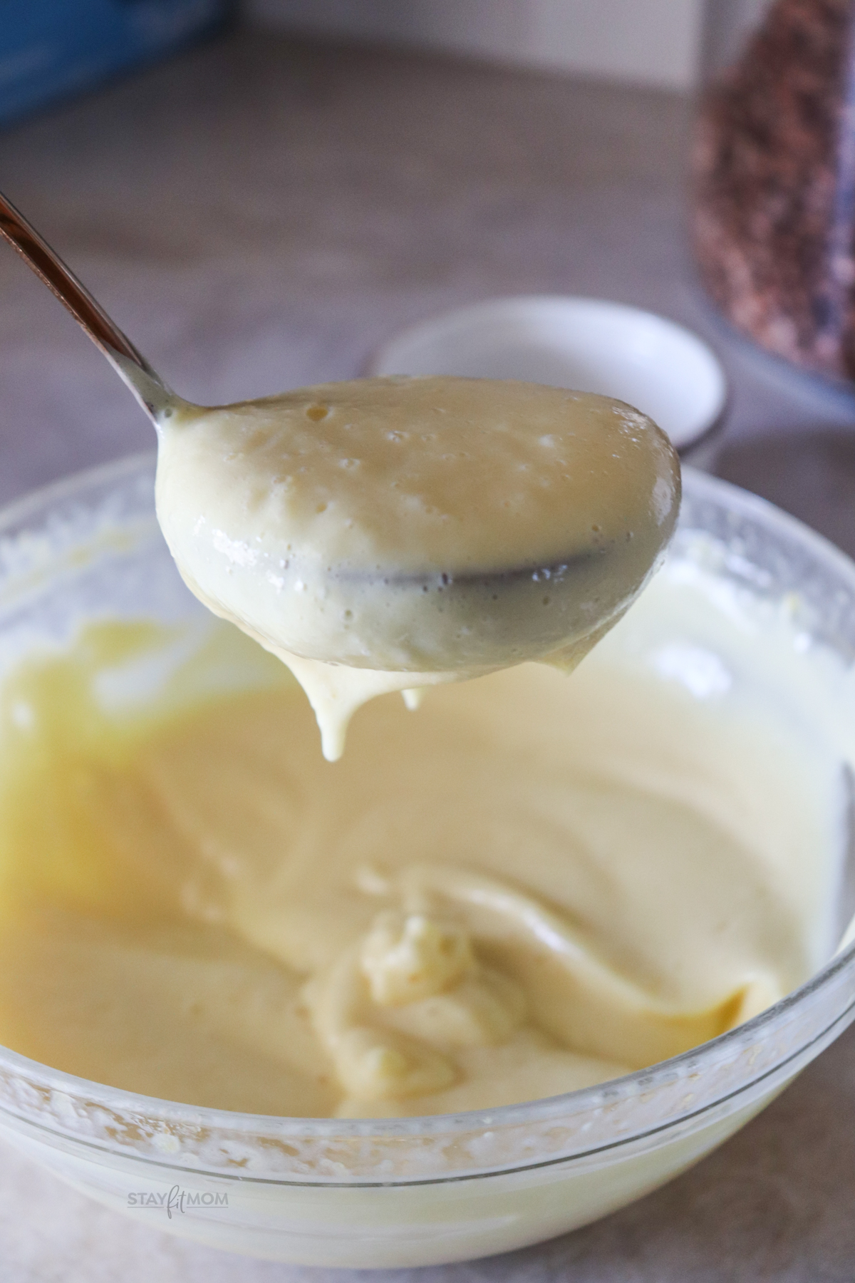 big scoop of vanilla protein pudding