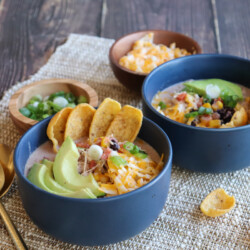 White chicken chili with Fritos, avocado, beans, corn, and green onions. #stayfitmom #chickenchili