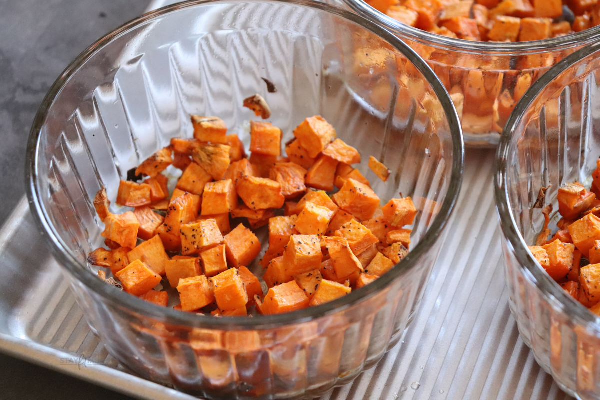 Glass bowls with diced sweet potatoes.