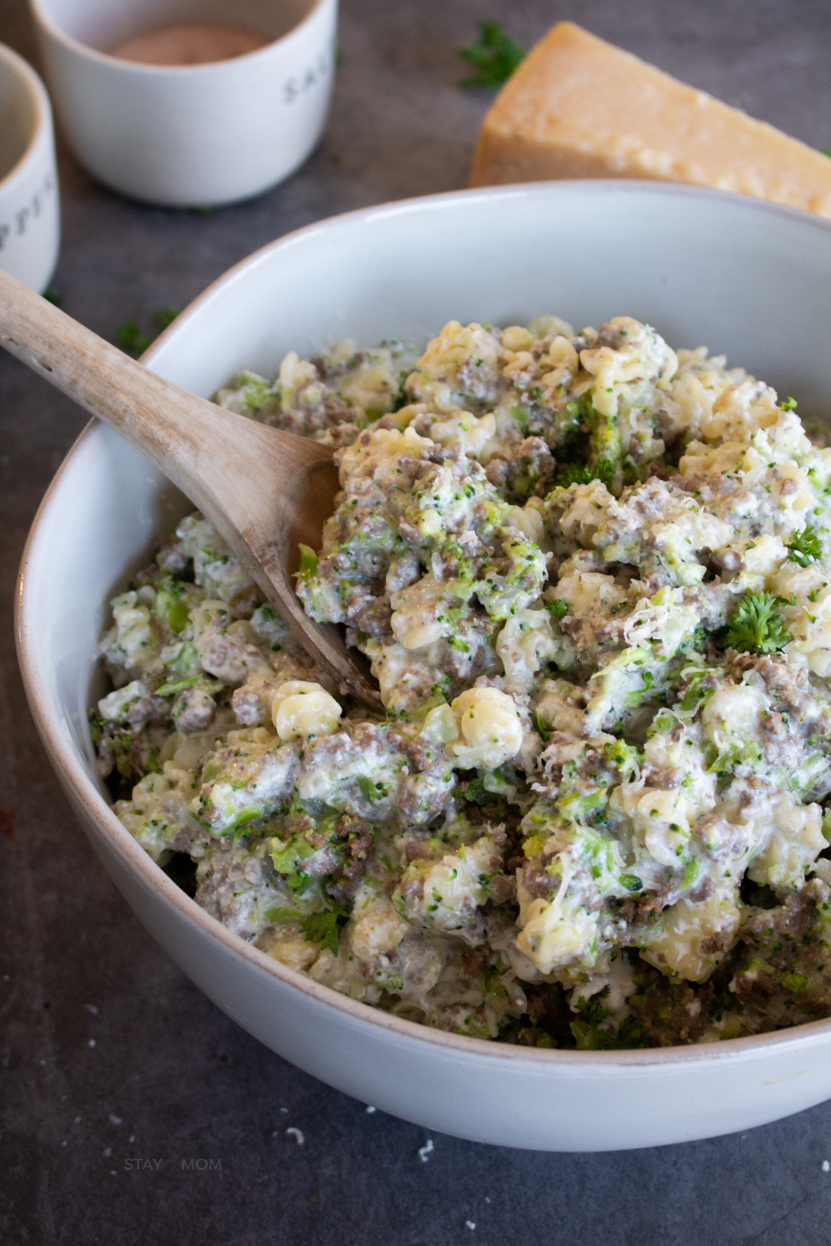 Beefy Alfredo Mac showing completed meal with pasta, ground beef, broccoli, and a creamy Alfredo sauce.