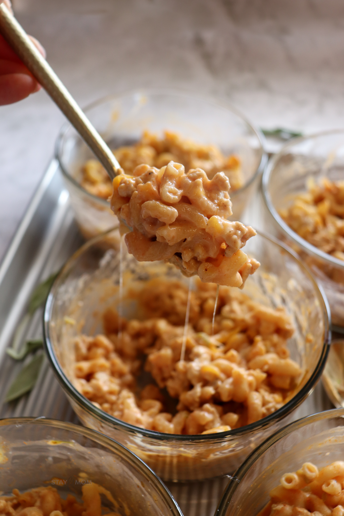 Chili Mac & Cheese Bowls showing a bite sized bit.