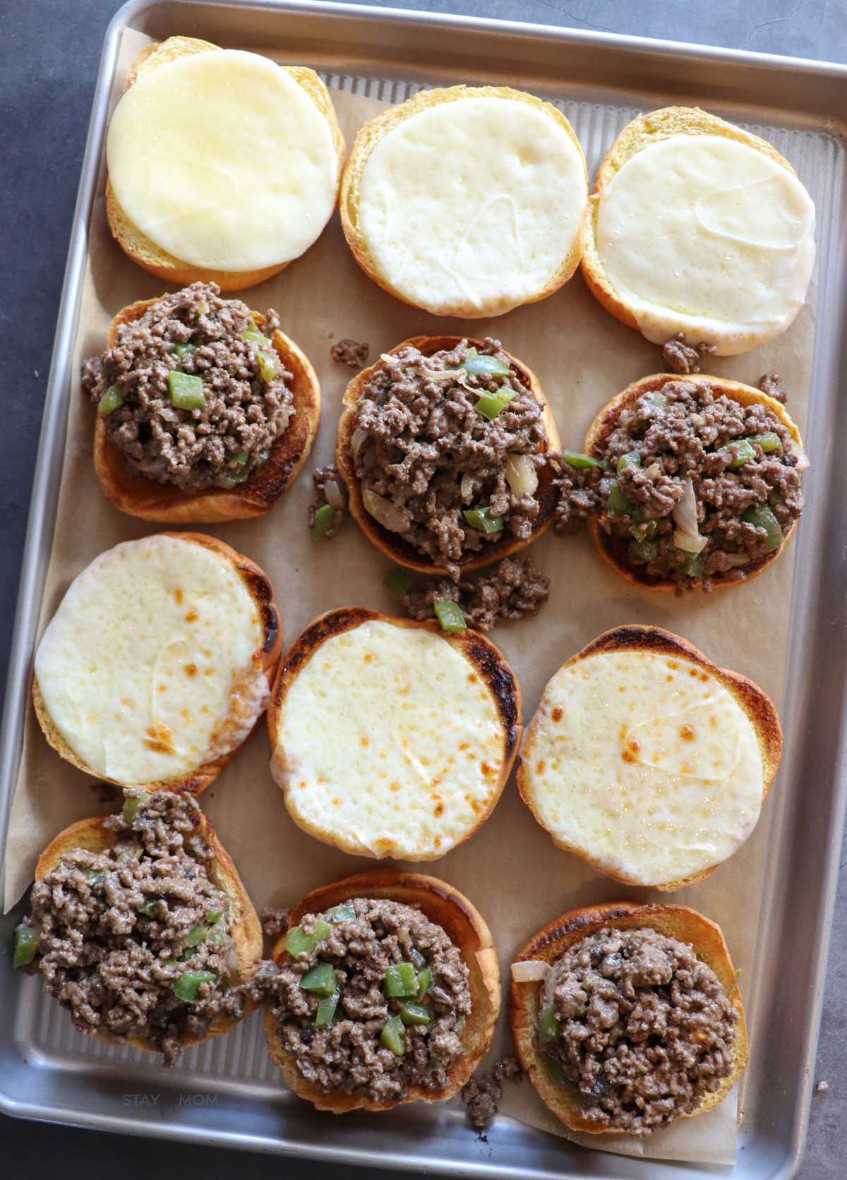 Philly Cheesesteak sloppy joes showing open faced sandwiches.