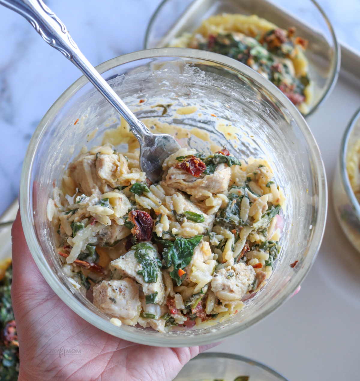 Sun Dried Chicken Orzo Easy Bakes showing meal stirred together and ready to eat.