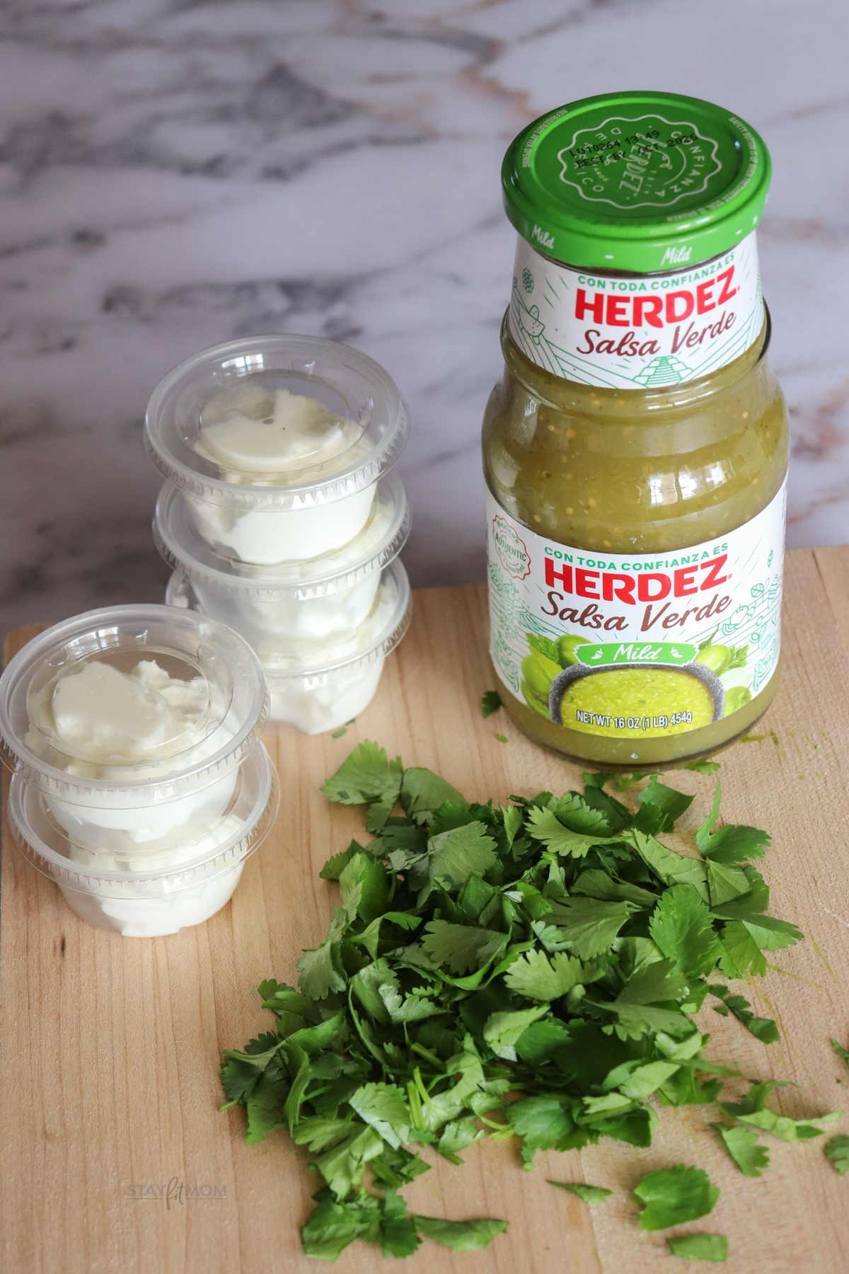 Image showing Herdez Salsa Verde, Greek yogurt in 2 oz containers and chopped cilantro.
