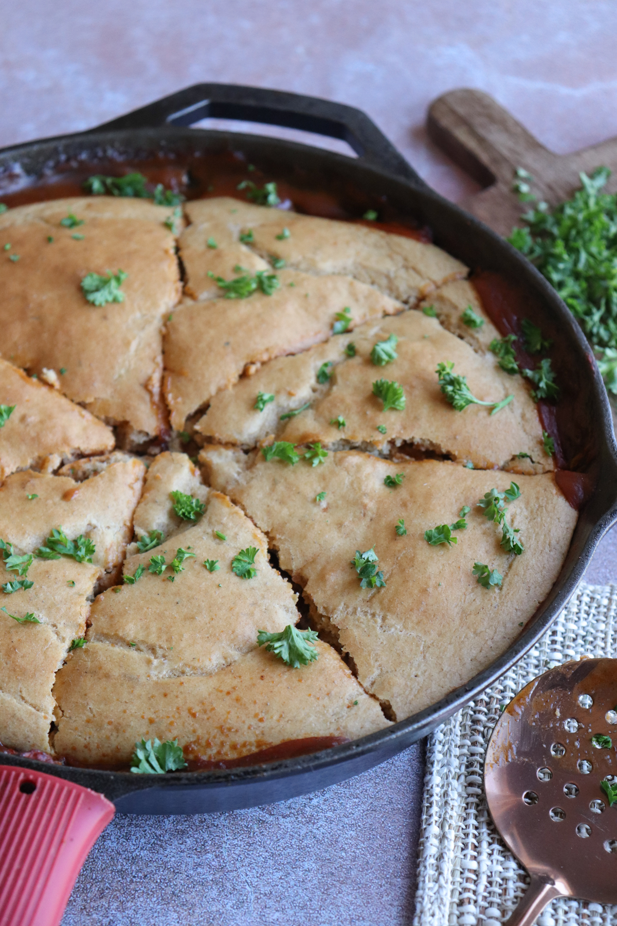 Beef Pot pie showing completed meal baked in a cast iron skillet.