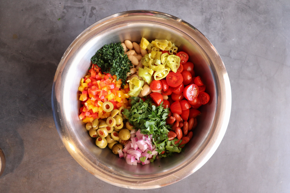 Bean Summer Salad showing ingredients arranged in bowl.