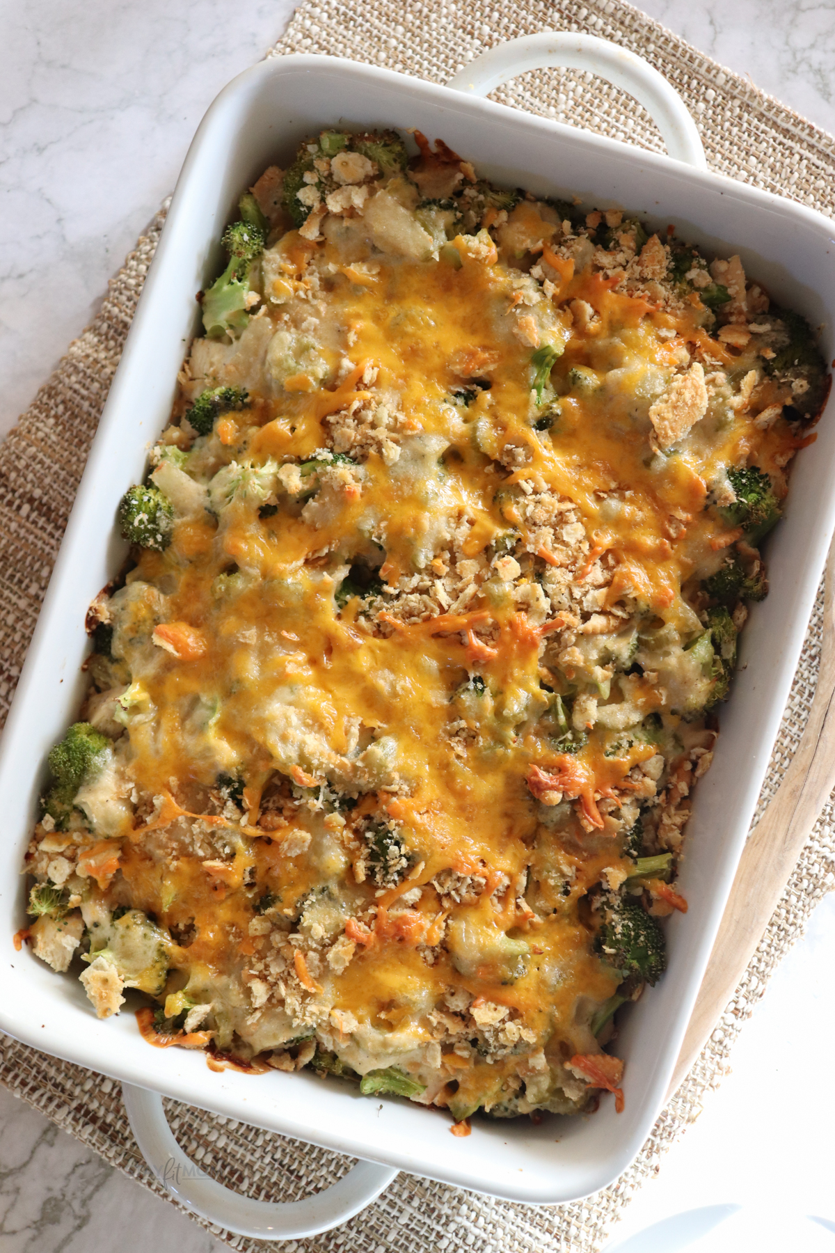 Chicken Divan showing completed recipe with visible broccoli, melted cheese and crushed crackers.