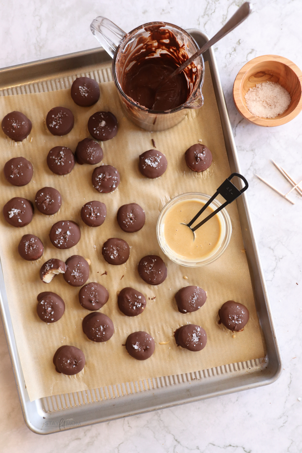 Frozen Banana Bites showing bites on parchment paper.
