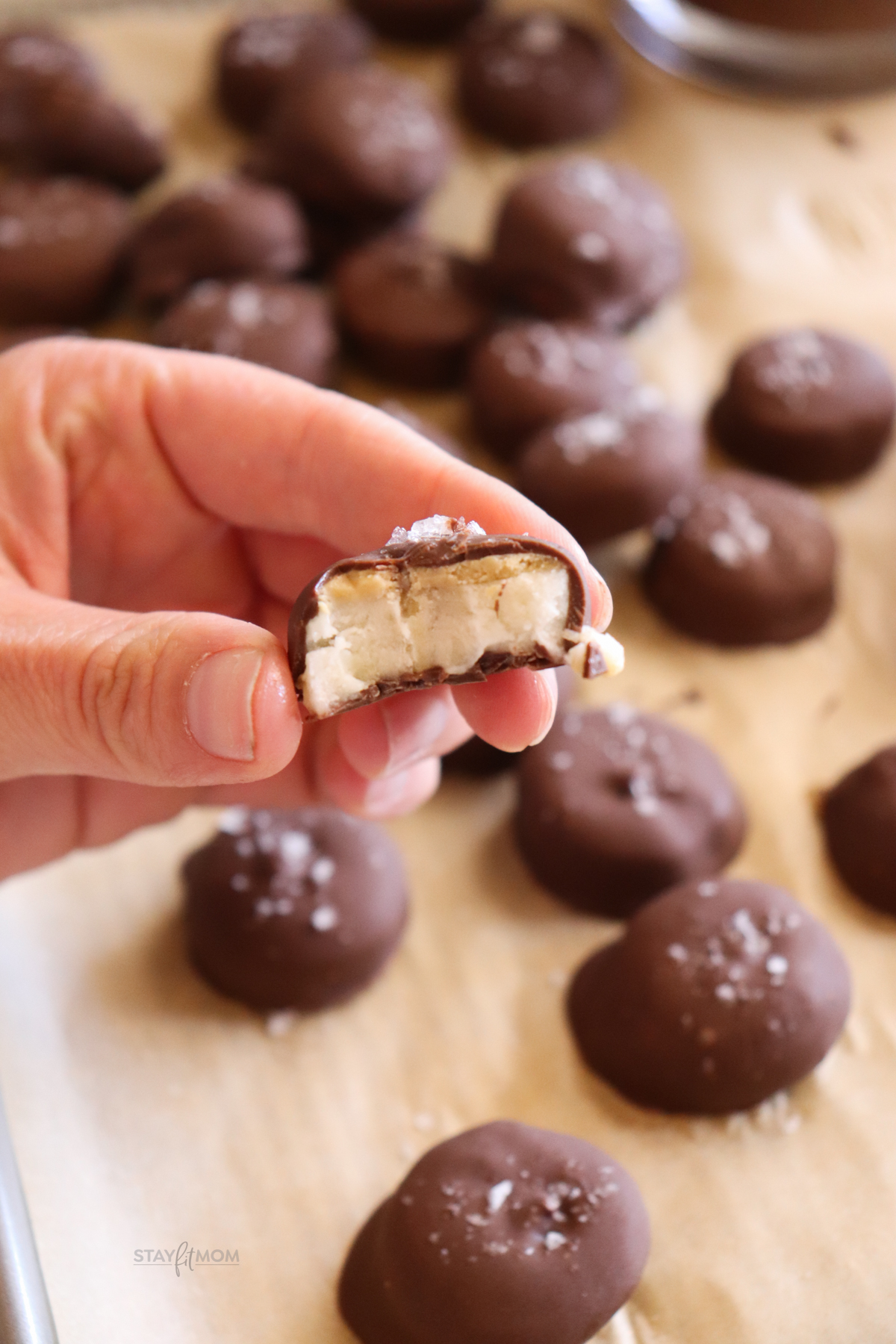 Frozen Banana Bites showing a banana bitten in half so you can see the inside.