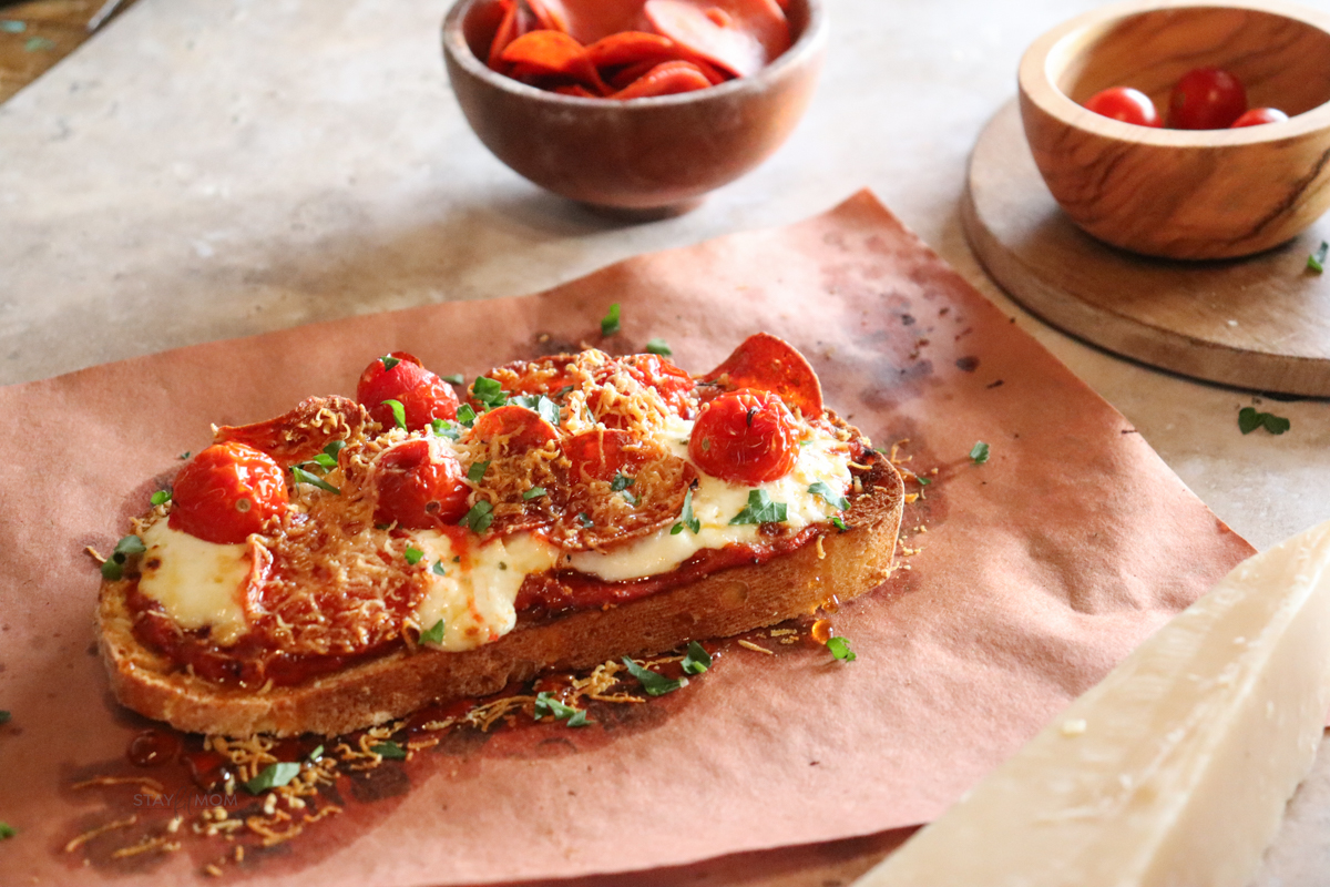 Sourdough Pizza Toast showing completed recipe with visible toasted sourdough, turkey pepperoni, melted cheese, and cherry tomatoes.