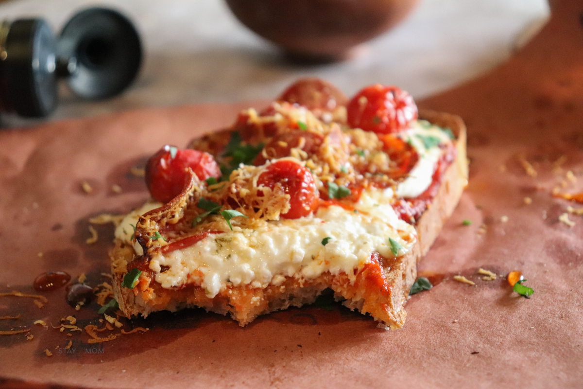 Sourdough Pizza Toast showing completed recipe with visible toasted sourdough, turkey pepperoni, melted cheese, and cherry tomatoes.