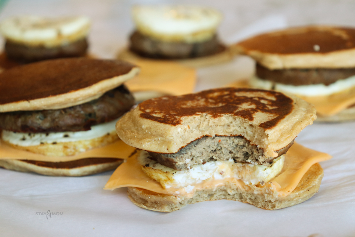 Sausage Griddlers showing completed sandwiches, one with a bite out of it.