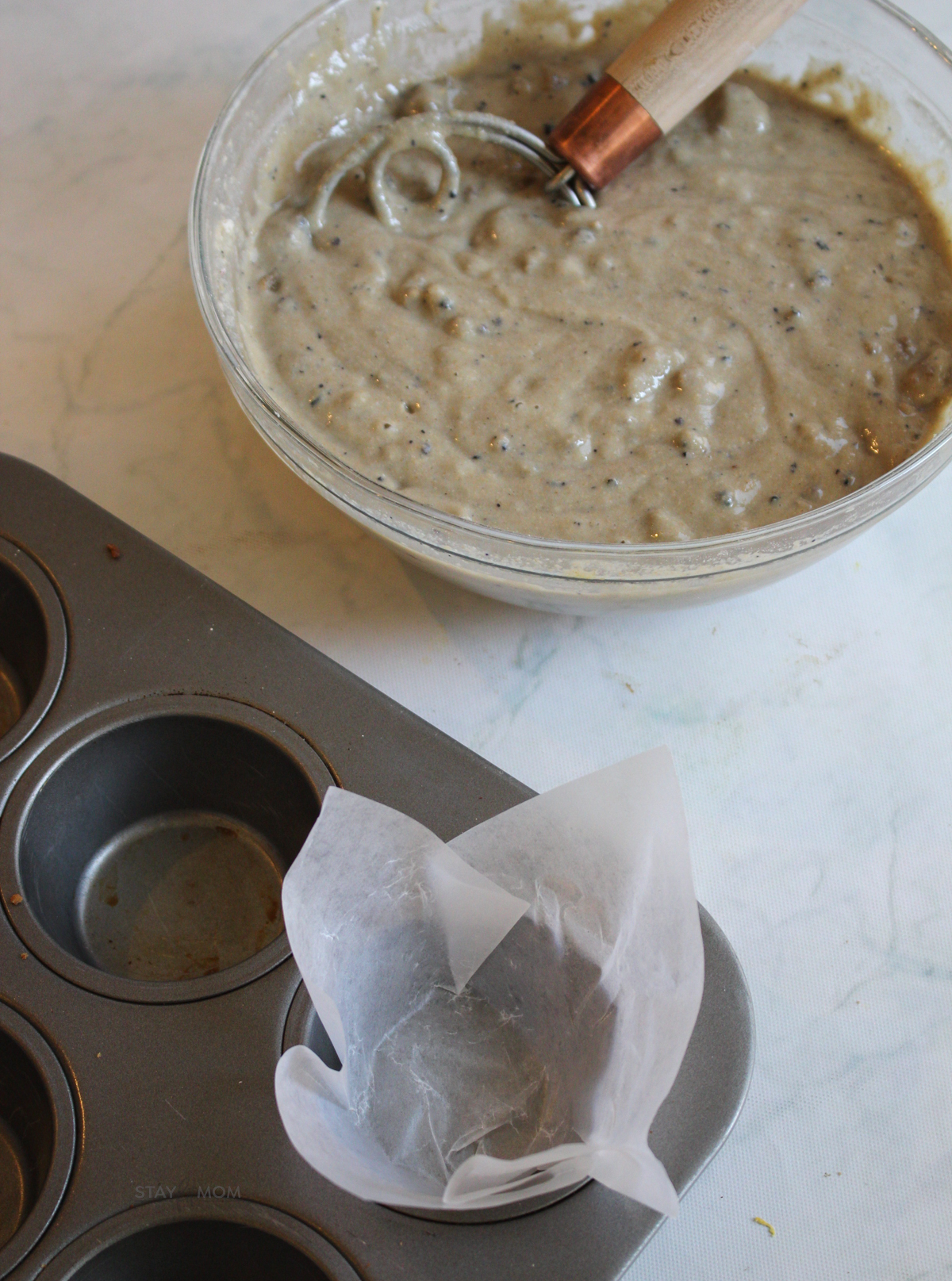 Sausage Blueberry Muffins showing muffin batter ready to be poured into muffin tin.