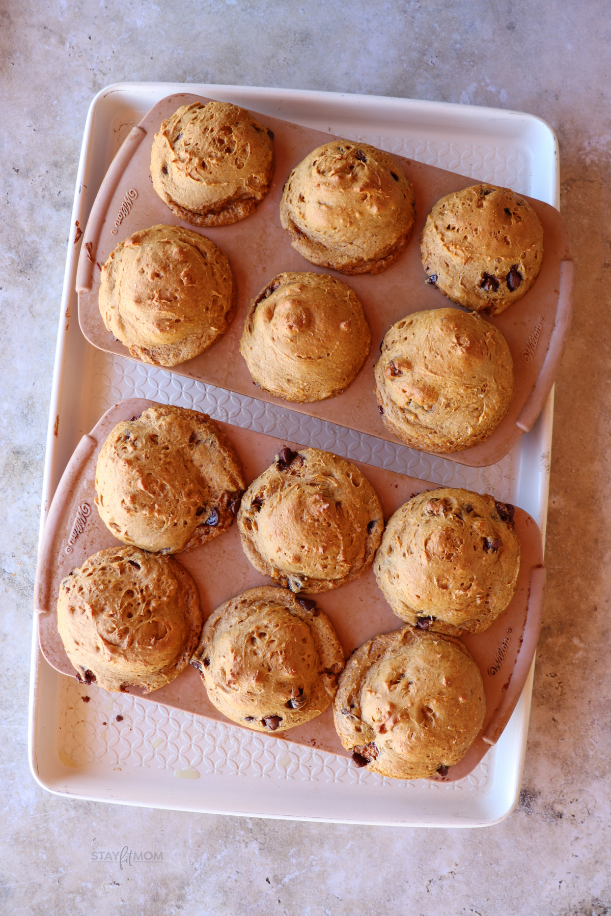 Pumpkin Protein Muffins showing muffins baked in muffin pan.