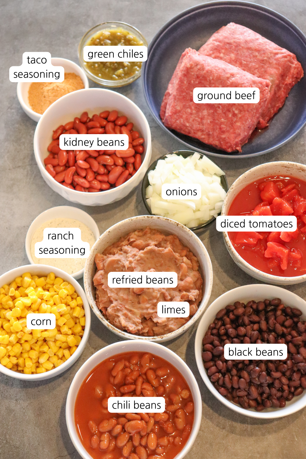 Taco Soup ingredients labeled in small bowls,