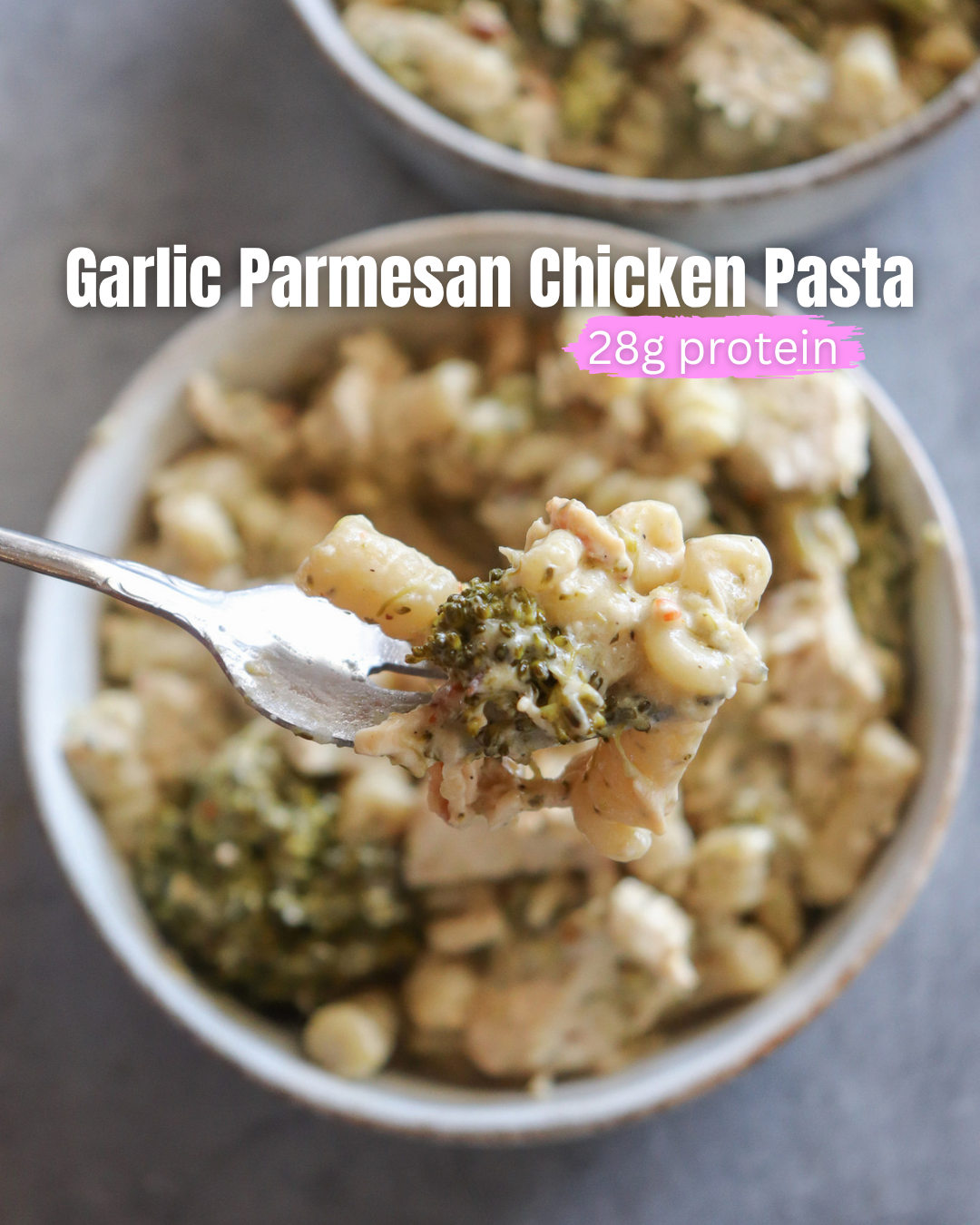 Garlic Parmesan Chicken Pasta showing a white bowl with completed recipe with a forkful of pasta, chicken, and broccoli in a creamy sauce.