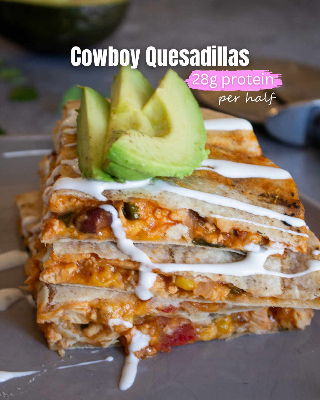 Cowboy quesadillas showing a finished quesadilla cut in 4 pieces of quesadilla stacked, drizzled with crema, and topped with avocado.