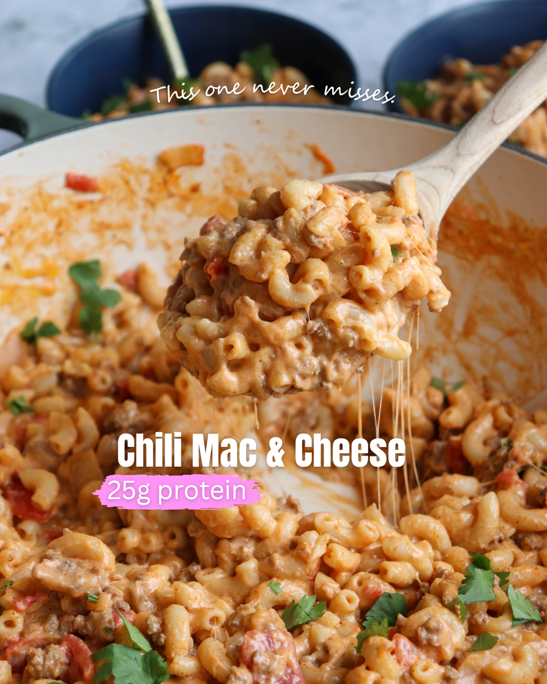 Chili Mac & Cheese showing a white pot with completed recipe with visible ground turkey, elbow pasta, and cheese.