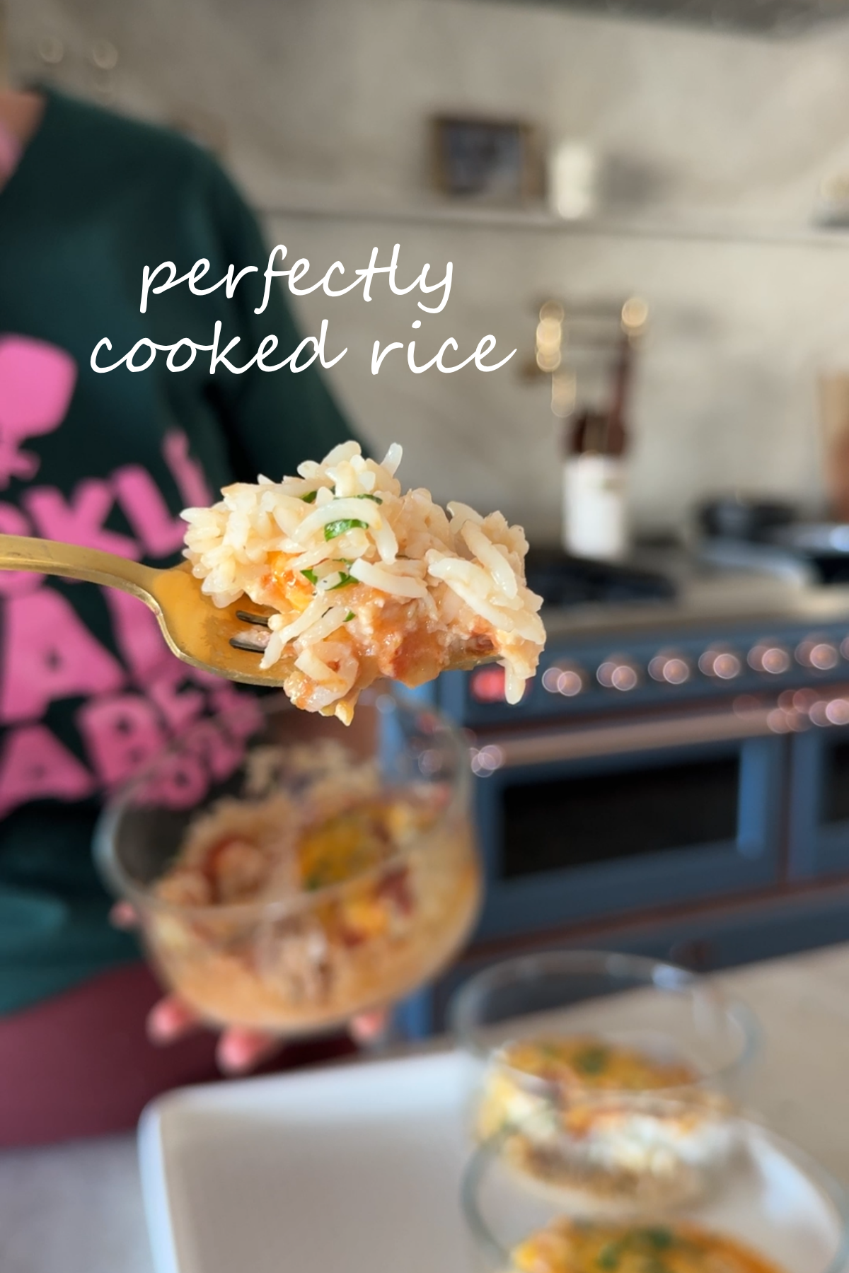 Krista holding a glass bowl blurred in the background with a close up of perfectly cooked rice.