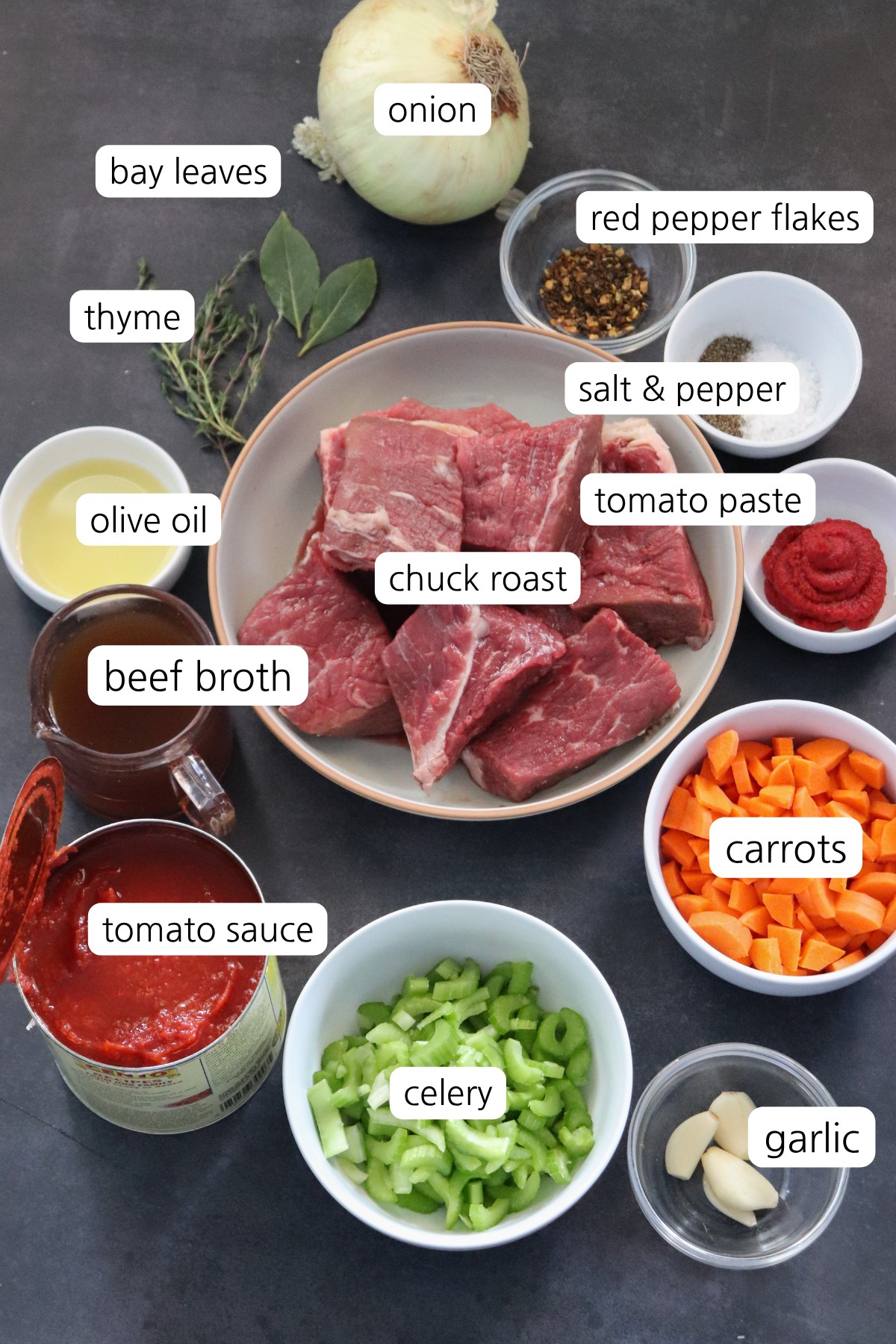 Beef Ragu ingredients labeled in small bowls.